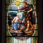 Vitrail représentant le baptême du Christ.