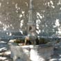 En 1832, la première fontaine est installée sur le plan de l'enclos, devenue place de la Fontaine. Construite en pierres de taille, elle servait d'abreuvoir pour les chevaux, dans lequel coulaient continuellement deux robinets placés à la hauteur que la pente naturelle de l'eau pouvait permettre. Cet abreuvoir public fut construit à l'emplacement occupé aujourd'hui par le n°2 de la place de la fontaine.