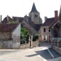 Ainay-le-Château est au Moyen Âge une des dix-sept châtellenies des ducs de Bourbon en Bourbonnais. La ville est alors close de remparts et un château se dresse autour de l'église Saint-Étienne.