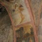 Peinture murale en l'église d'Audressein : ange musicien jouant de la vielle médiévale à l'aide d'un archer.